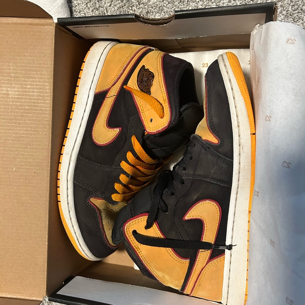 Nike Jordans  Black and Orange High-Top Sneakers